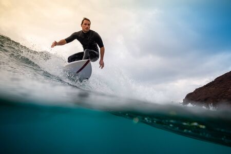 Surfer riding waves on the island of fuerteventuraのeditorial素材