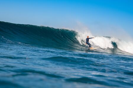 Surfer riding waves on the island of fuerteventuraのeditorial素材