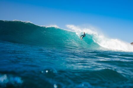 Surfer riding waves on the island of fuerteventuraのeditorial素材