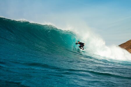 Surfer riding waves on the island of fuerteventuraのeditorial素材