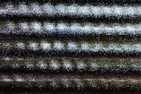 Strange effect of light passing through a blind on a translucent glass
