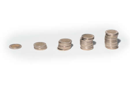 A lot of euro coin money on a white background for investing, trading and business enrichmentの写真素材