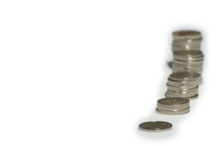 A lot of euro coin money on a white background for investing, trading and business enrichment