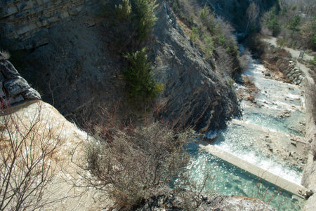 Enchanting view of a cascading mountain streamの写真素材