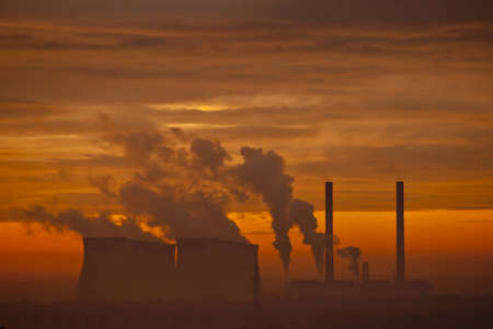 Ferrybridge C power station set against a moody orange skyの写真素材