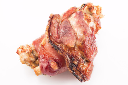 Roast pork knuckle topped with honey and beer.の写真素材