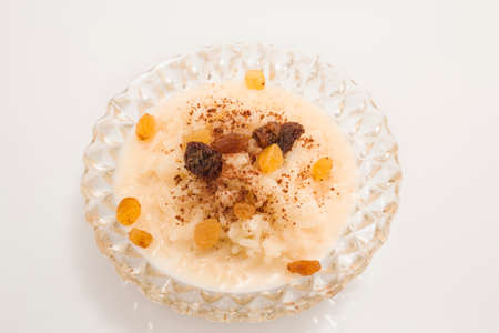 Rice pudding with cinnamon and raisins.の写真素材