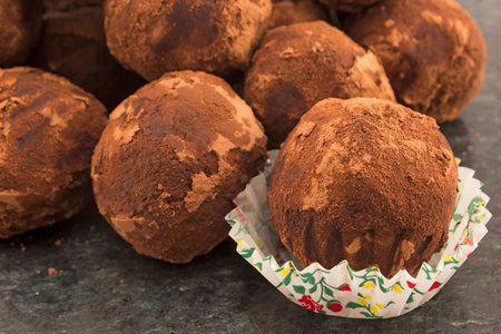 Chocolate balls truffle with rum and raisins.