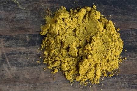 Pile of Curry Spices on a Wooden Board.の写真素材