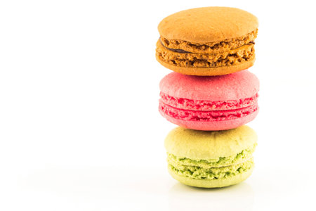 Three Fresh Colorful Macaroons Isolated on White Background.の写真素材