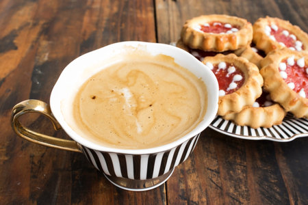 Coffee with Biscuits on a Rustic Wooden Background.の写真素材