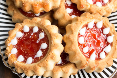 Tea Biscuits with Jam on a Plate.の写真素材