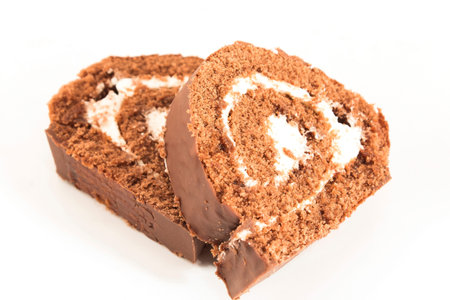 Sponge Cake Chocolate Roll Isolated on White.の写真素材