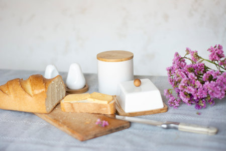 Bread and butter on the table. Beautiful kitchen still life