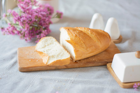 Bread and butter on the table. Beautiful kitchen still life
