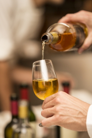 Someliere serveing wine の写真素材