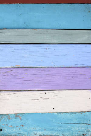 Old vintage colorful paint over wood の写真素材