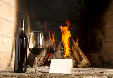 Wine by the fireplace, glasses of wine  Message  Sample text の写真素材