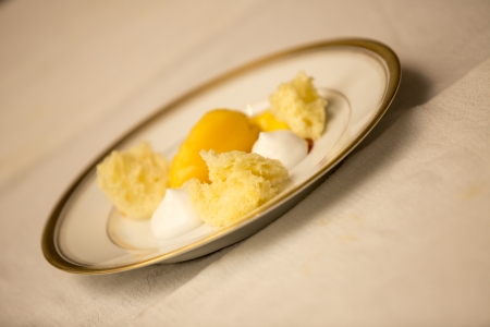 Preparation of the vegetables in the kitchen  Meal for a lot of people  White and gold plates ready to be served の写真素材