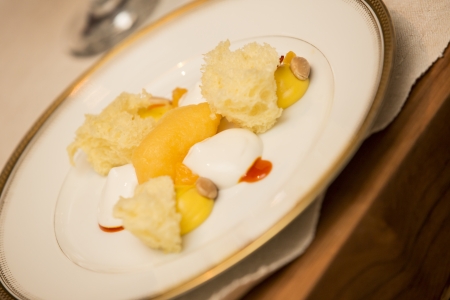 Preparation of the vegetables in the kitchen  Meal for a lot of people  White and gold plates ready to be served の写真素材