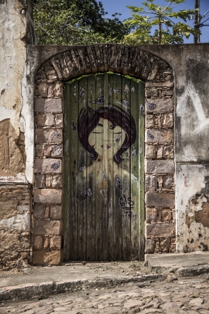 A weathered blue door on the island of Santorini, Greece, Europeの写真素材