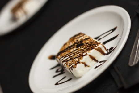 Ice cream with Chocolate topping Dessert over whiteの写真素材