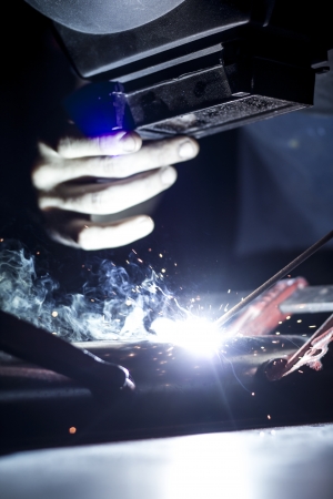 Welding with sparks の写真素材
