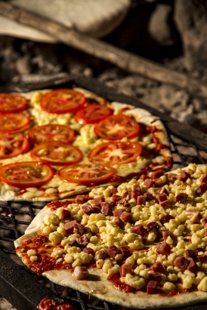 Pizza with ham, pepper and olivesの写真素材