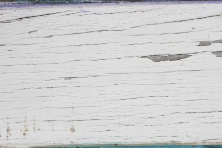 Old wooden painted surface with cracks の写真素材