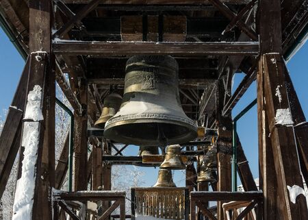 Big bell covered with hoarfrostの写真素材