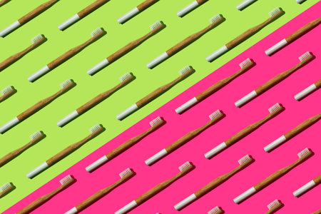 Pattern: bamboo toothbrushes on bicolor background