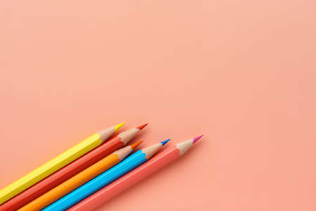 Colorful pencils on pink backgroundの写真素材