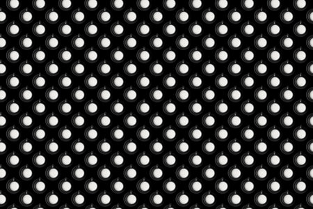 Black and white pattern: a lot of cappuccino in cups with saucers on a black background, flat lay.