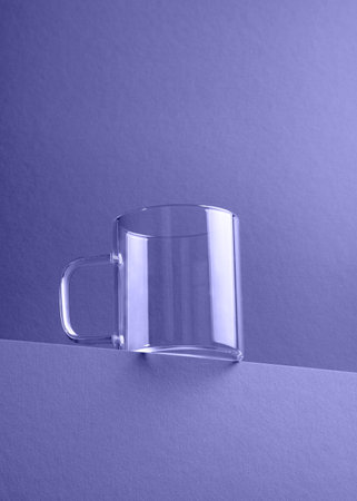 Empty glass cup isolated. 2022 very peri color.の写真素材