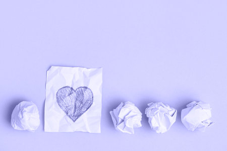 Crumpled pieces of paper and one unfolded. Very peri color 2022.の写真素材