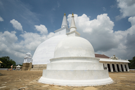 Anuradhapura ruin, historical capital city of the Sinhalese Buddhist state on Sri Lances The photograph is presenting the Thuparamaya dagoba (stupa).の写真素材