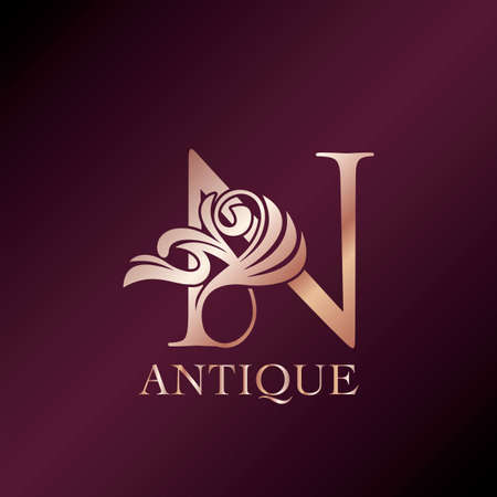 Antique Letter N Initial Logo Elegance Gold Rose Luxury Ornate Deco Swirl Shape Template Design.のイラスト素材