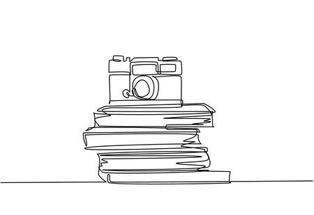 Single continuous line drawing of vintage classic analog pocket camera above stack of books on desk. Old retro photography equipment concept. One line draw design graphic vector illustrationのイラスト素材