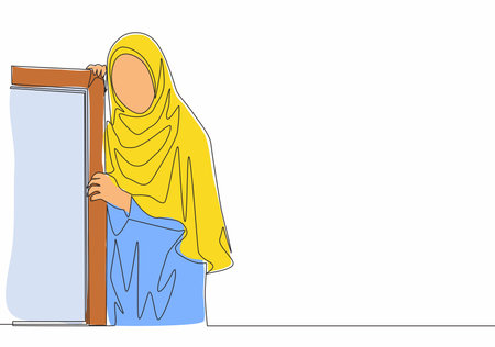 Single continuous line drawing of young beautiful muslimah wearing head scarf leaning on the wall. Beautiful Asian woman model in trendy hijab fashion concept one line draw design vector illustrationのイラスト素材