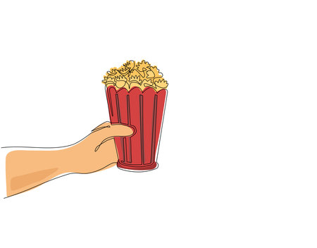 Single one line drawing hand holding popcorn. Human hands holding popcorn box. I love movie cinema icon. Watching movie concept in flat design style. Modern continuous line draw design graphic vectorのイラスト素材