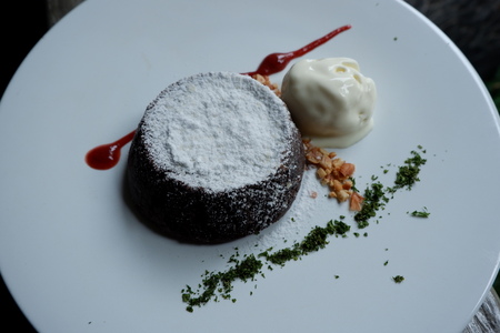 It is Time for Dessert, Molten Lava Cake with Vanilla Ice Cram and Strawberry Sauceの写真素材