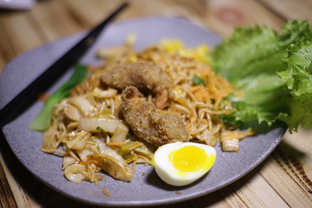Photograph of Chicken Main Course from Hype Cafe with Wood Background and from Top Viewの写真素材