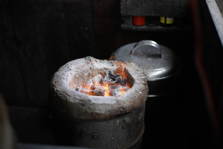 A Photograph of a Traditional Stone Stove at Traditional Restaurantの写真素材