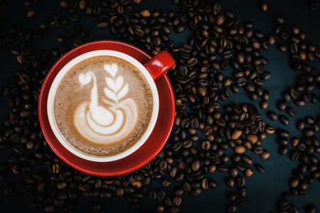 coffee, coffee beans, and red mug.の写真素材