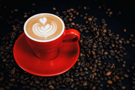 coffee, coffee beans and red mug.の写真素材