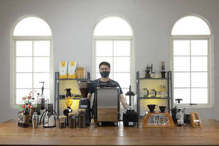 A Professional barista preparing and demonstrating coffee alternative method at the coffee shop with beautiful cafe concept.のeditorial素材