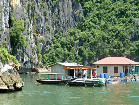 Floating village at Halong Bayの写真素材