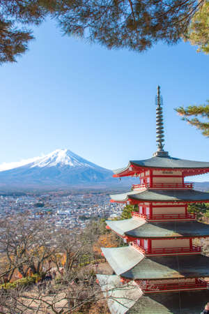 Yamanashi; Japan - The Fuji-San and city in high view with night blue clear sky take from Chureito Pagoda view Point; Shimoyoshida station; near Kawaguchiko and Tokyo.のeditorial素材