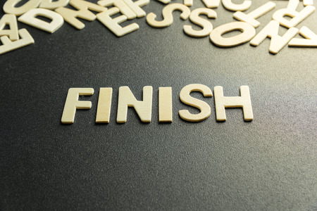 FINISH word made with wooden letterの写真素材