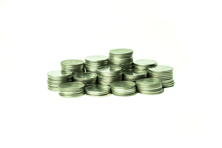 stack of coins isolated on white backgroundの写真素材